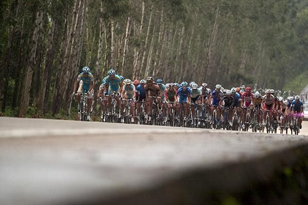 The peloton make their way on the penultimate stage of the tour from Danzhou to Dongfang.