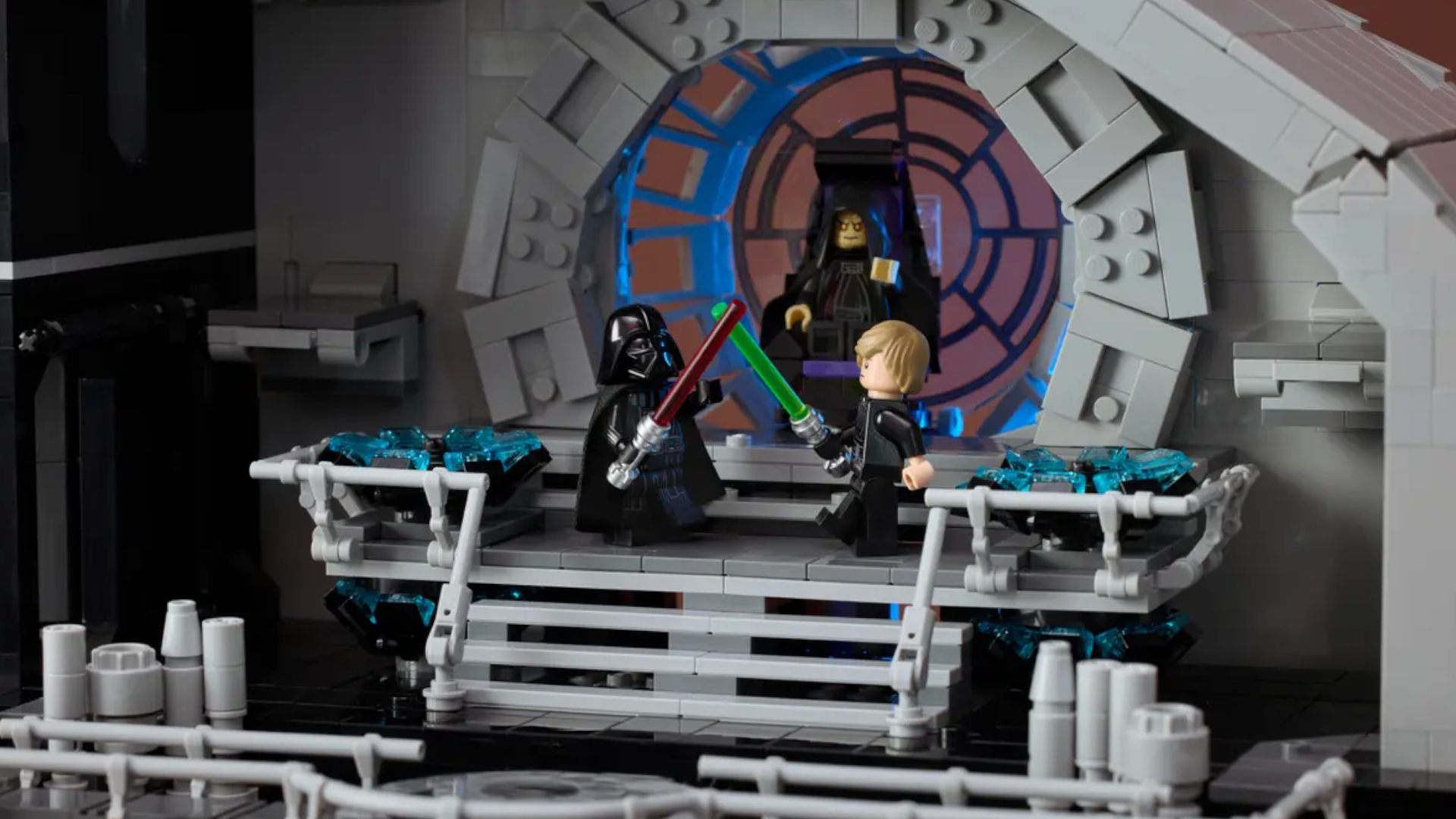 Darth Vader and Luke Skywalker minifigures on stairs in front of the Emperor's throne