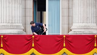 A cleaner preparing Buckingham Palace