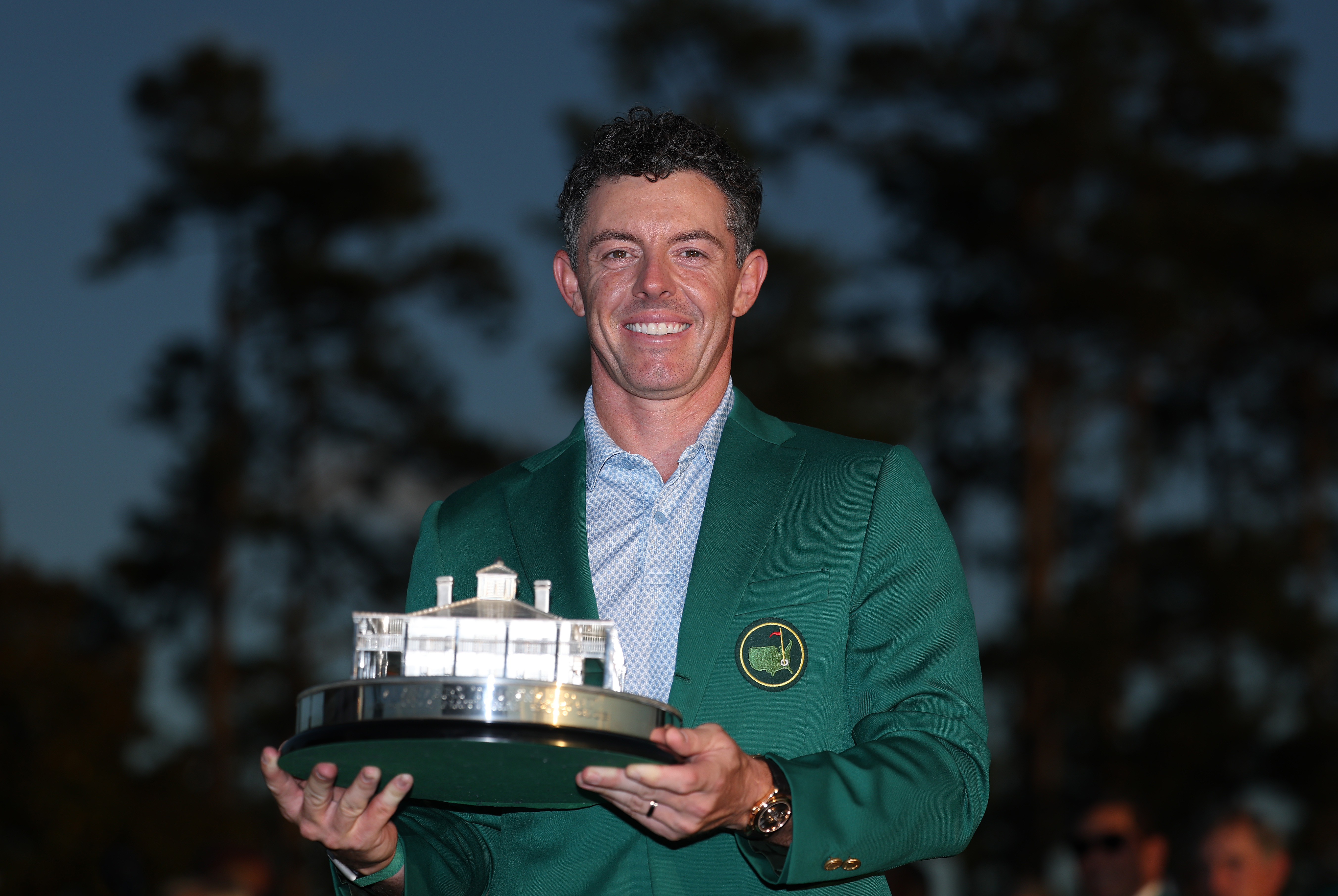 Rory McIlroy poses with the Masters trophy during the Green Jacket Ceremony