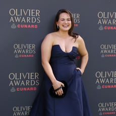 Giovanna Fletcher in navy ballgown on Olivier Awards 2026 red carpet.