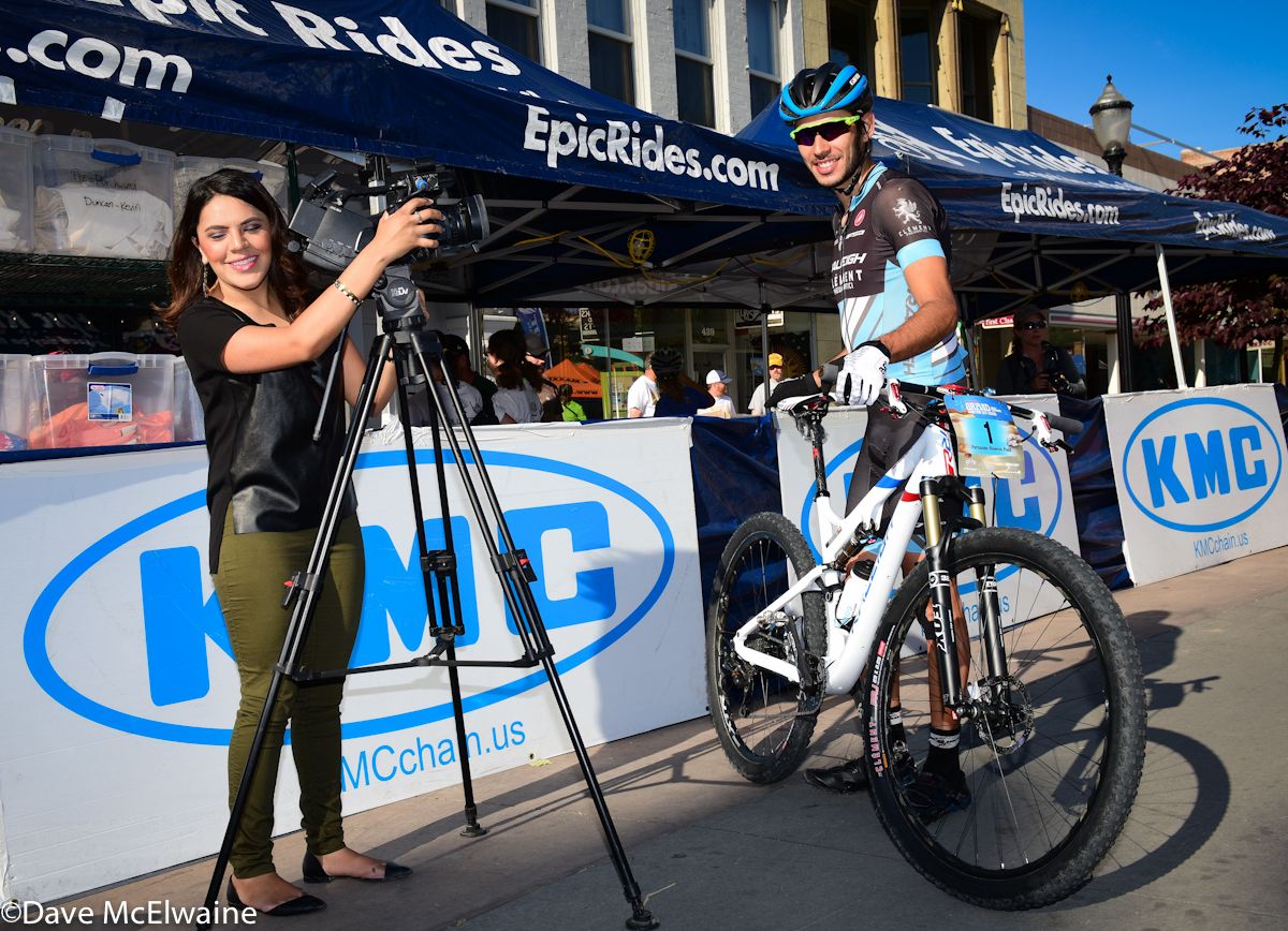 Defending champion Fernando Paez (Raleigh Clement) does a television interview before the race