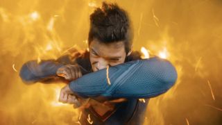 Superman (David Corenswet) withstands a blast in Superman