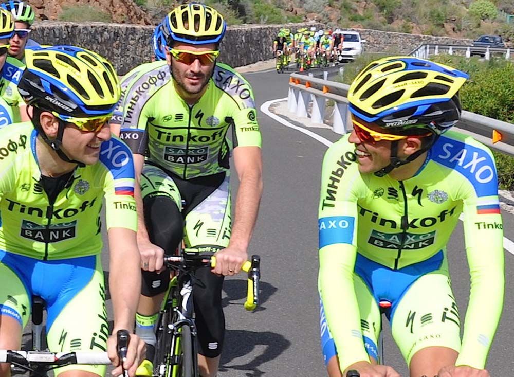Alberto Contador enjoys a joke as Ivan Basso follows him