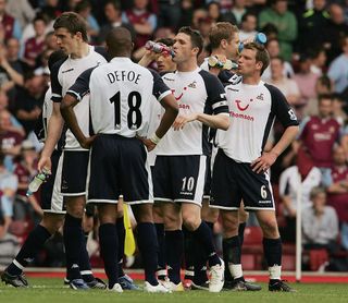 Tottenham Hotspur take refreshments during the Barclays Premiership match between West Ham United and Tottenham Hotspur at Upton Park on May 7, 2006 in London, England.