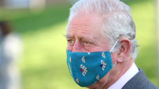 Prince Charles, Prince of Wales wearing a face-mask during a visit to Gloucestershire Vaccination Centre at Gloucestershire Royal Hospital