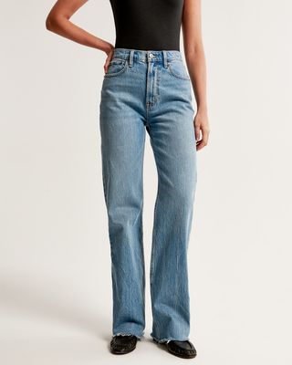 cropped shot of Abercrombie & Fitch in blue relaxed jeans