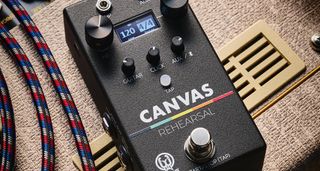 Walrus Audio Canvas Rehearsal: the compact black utility pedal is photographed against a fawn-covered Vox tube amp combo.
