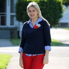 matching red pants and hair accessory catherine hageman