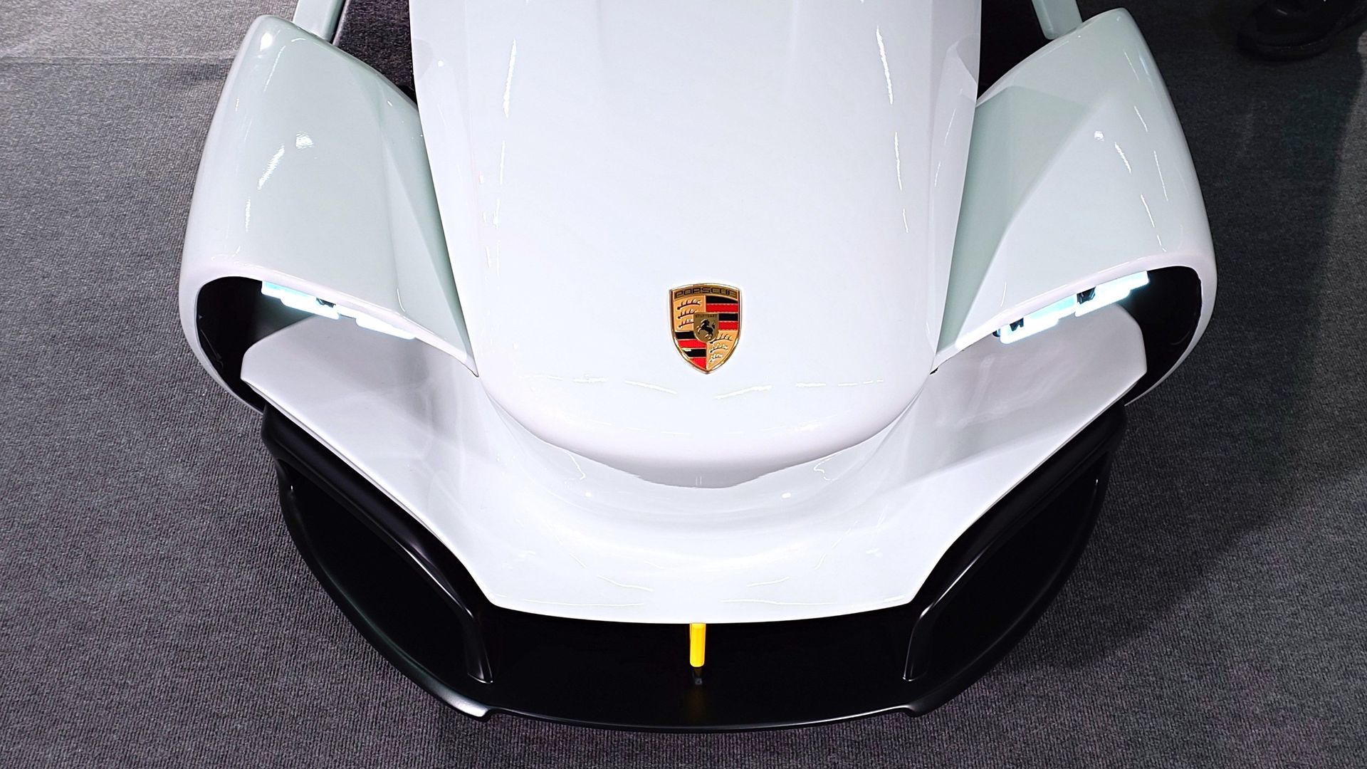 Closeup photo of the ImSim Porsche Raceborn simulator showing the Porsche logo