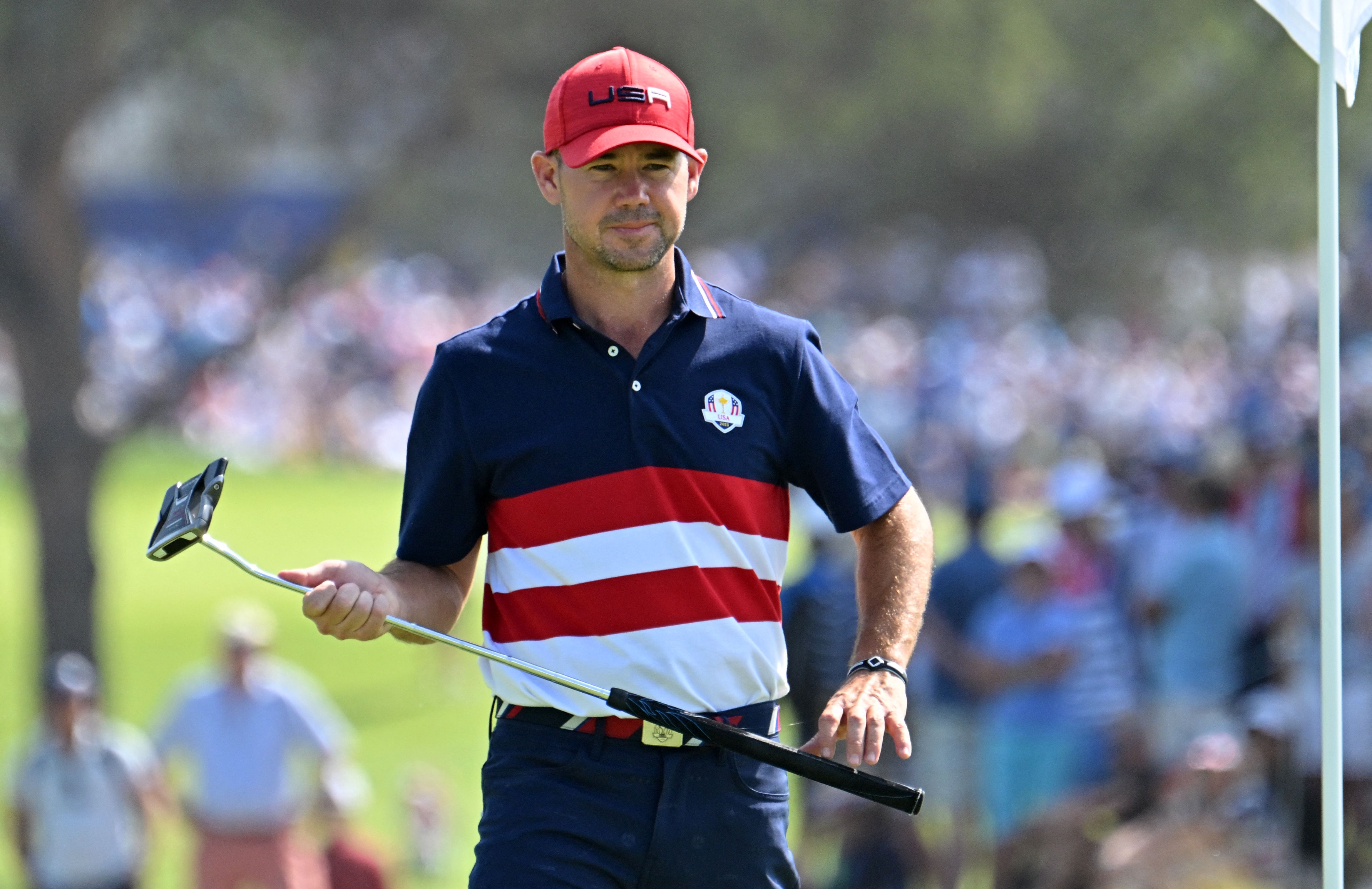 Brian Harman lines up a putt