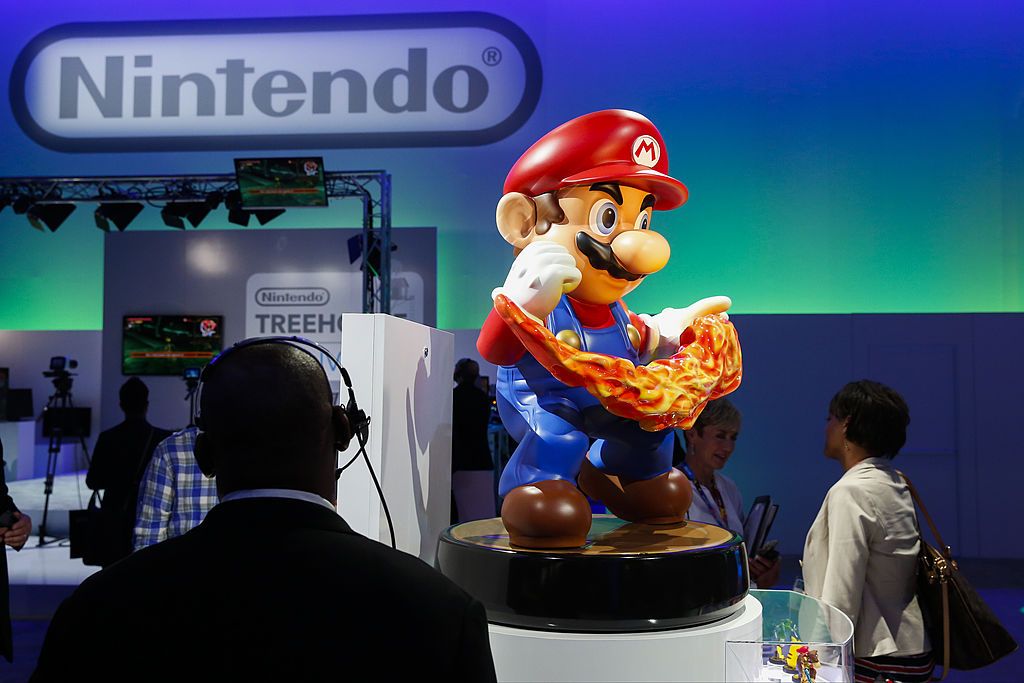 Mario promotes Nintendo Co.'s Amiibo collectible characters featuring NFC technology
