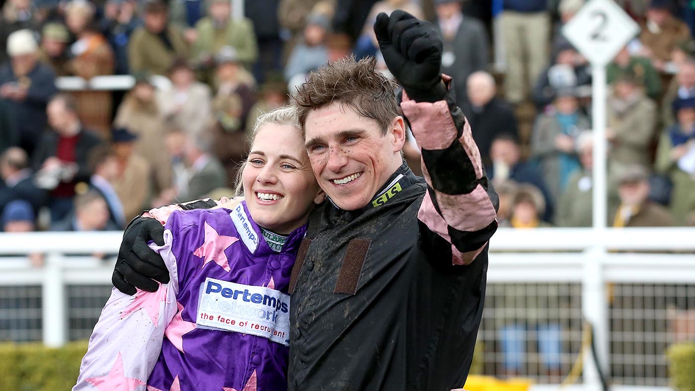 Jockey Harry Skelton celebrates victory with partner Bridget Andrews (left) after the Randox Health County Handicap Hurdle during Gold Cup Day of the 2019 Cheltenham Festival at Cheltenham Racecourse