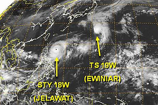 The eye of Jelawat is clearly visible in the Western Pacific on Wednesday, Sept. 26, 2012. Ewiniar was spinning east of Japan.