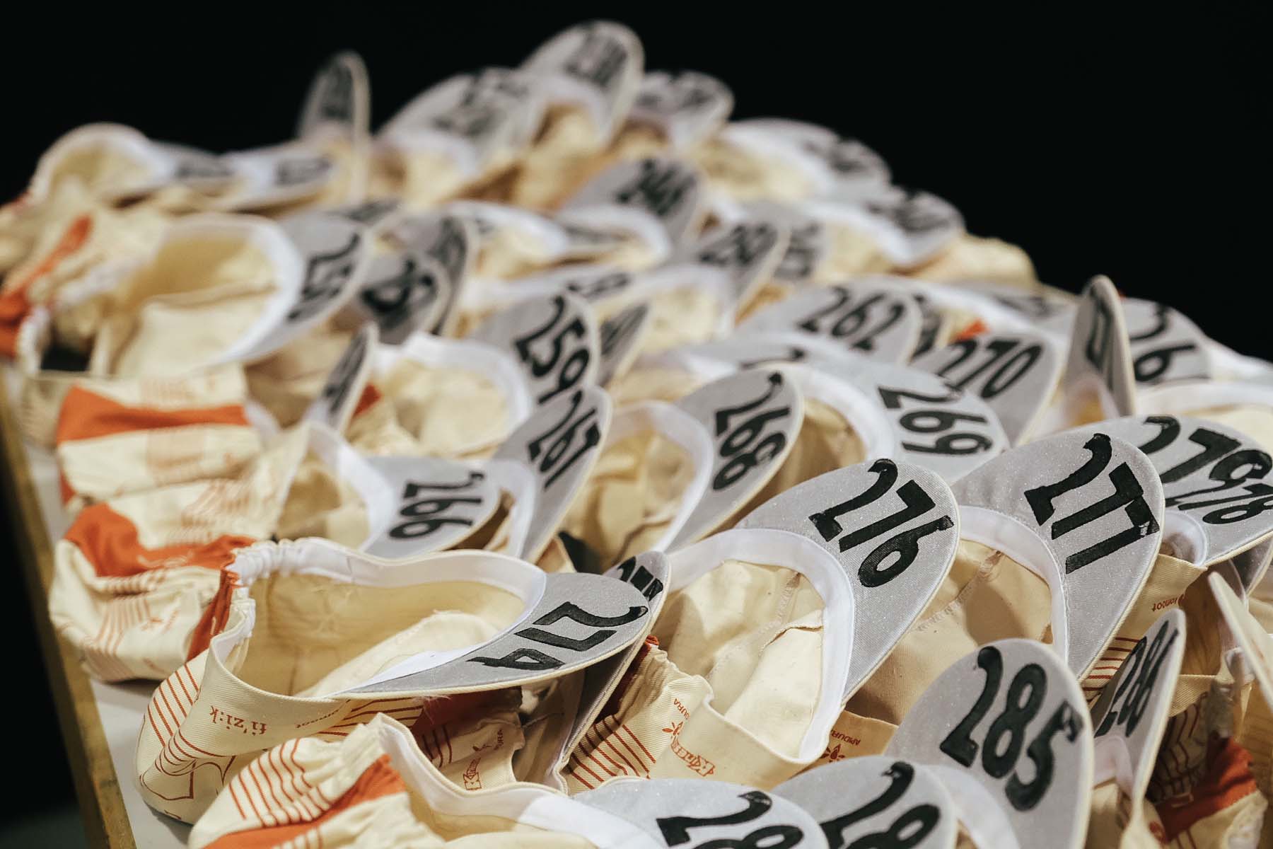 Caps with rider numbers at the Transcontinental Race