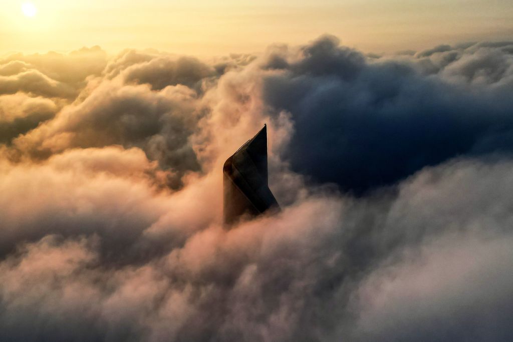 Kuwait City's al-Hamra tower caught in heavy fog
