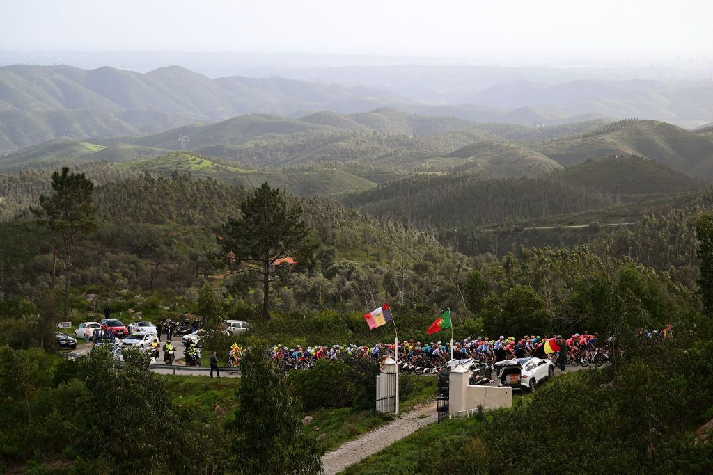 ALTODAFOIA PORTUGAL FEBRUARY 15 A general view of the peloton compete climbing to the Alferce 418m during the 50th Volta ao Algarve em Bicicleta 2024 Stage 2 a 1719km stage from Lagoa to Alto da Foia 888m on February 15 2024 in Alto da Foia Portugal Photo by Dario BelingheriGetty Images
