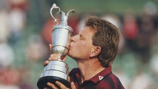 Nick Price of Zimbabwe kisses the Claret Jug after winning the 123rd British Open on 17 July 1994 on the Ailsa Course at Turnberry