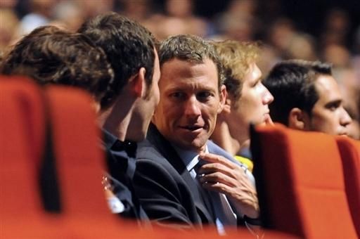 Mark Cavendish (Columbia-HTC) and Lance Armstrong (Astana) talk during the 2010 Tour de France presentation in Paris, l-r.