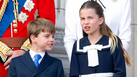 Prince Louis of Wales and Princess Charlotte of Wales watch an RAF flypast from the balcony of Buckingham Palace 