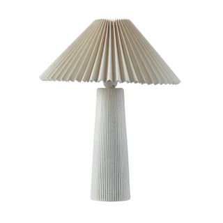 table lamp with a ribbed base and pleated shade