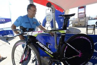 A commissaire weighs a bike at the Vuelta a Espana (Photo: Watson)