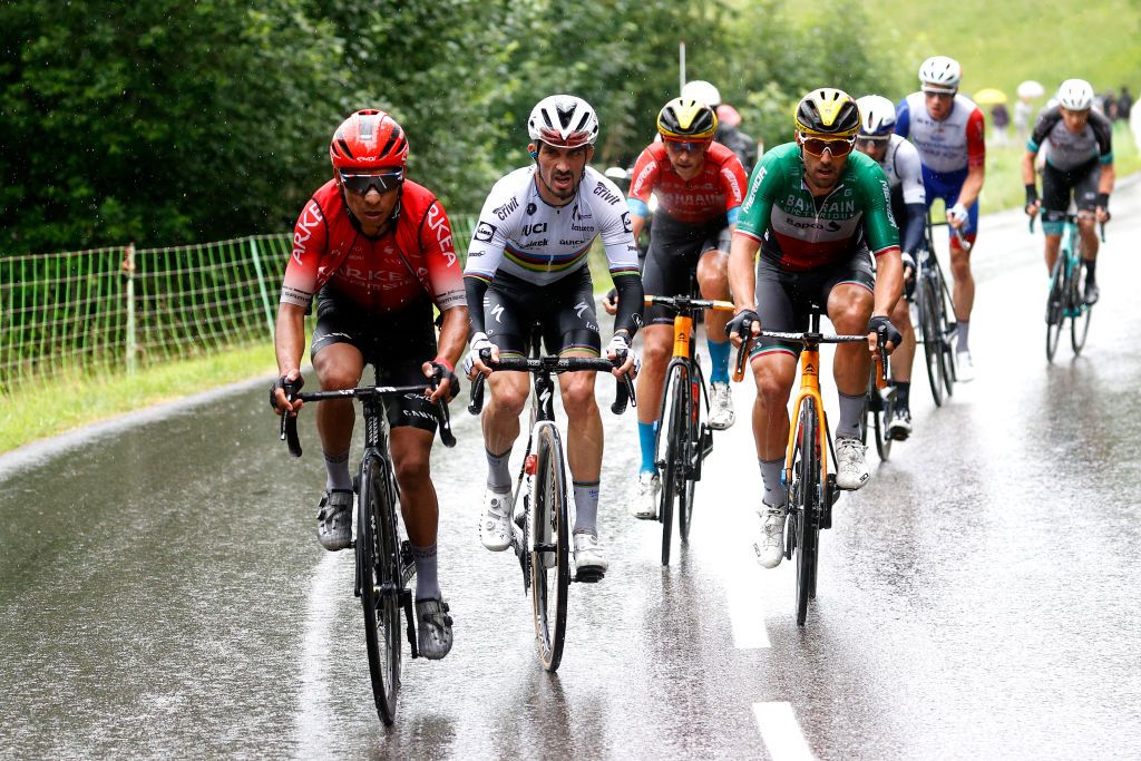 TIGNES FRANCE JULY 04 Nairo Quintana of Colombia and Team Arka Samsic Julian Alaphilippe of France and Team Deceuninck QuickStep Sonny Colbrelli of Italy and Team Bahrain Victorious leads The Peloton during the 108th Tour de France 2021 Stage 9 a 1449km stage from Cluses to Tignes Monte de Tignes 2107m LeTour TDF2021 on July 04 2021 in Tignes France Photo by Chris GraythenGetty Images