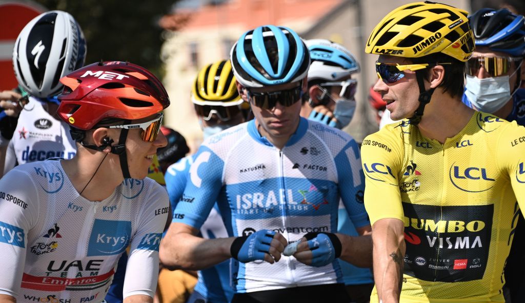 Team UAE Emirates rider Slovenias Tadej Pogacar wearing the best youngs white jersey L talks to Team Jumbo rider Slovenias Primoz Roglic wearing the overall leaders yellow jersey prior to the 16th stage of the 107th edition of the Tour de France cycling race 164 km between La Tour du Pin and VillarddeLans on September 15 2020 Photo by AnneChristine POUJOULAT AFP Photo by ANNECHRISTINE POUJOULATAFP via Getty Images