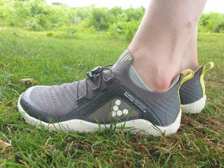 Vivobarefoot Trail Knit FG shoes on grass
