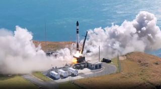 A Rocket Lab Electron rocket launches the "RAISE and Shine" mission from New Zealand on Dec. 13, 2025.