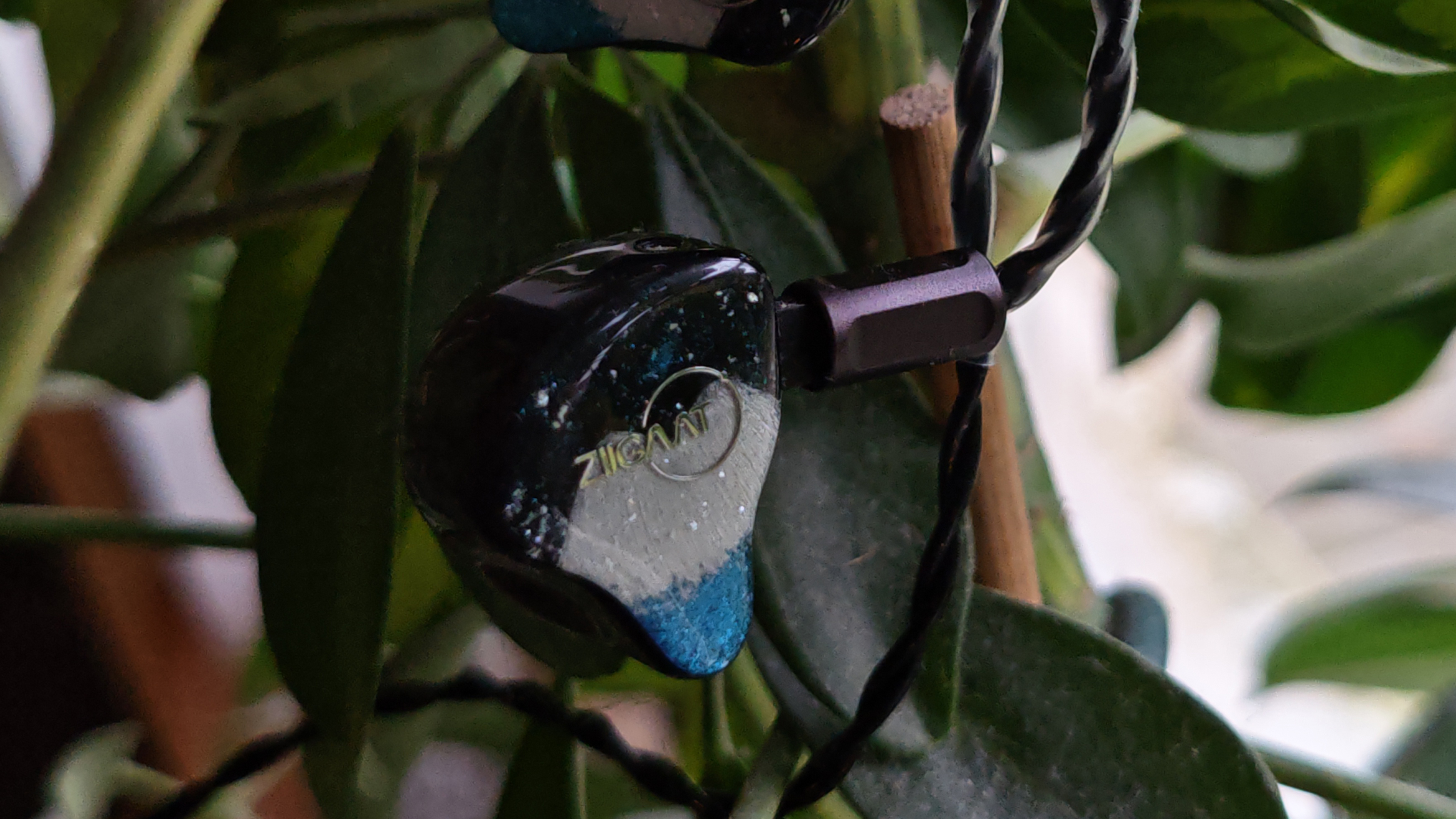 Various photos of the Ziigaat Horizon IEMs. 