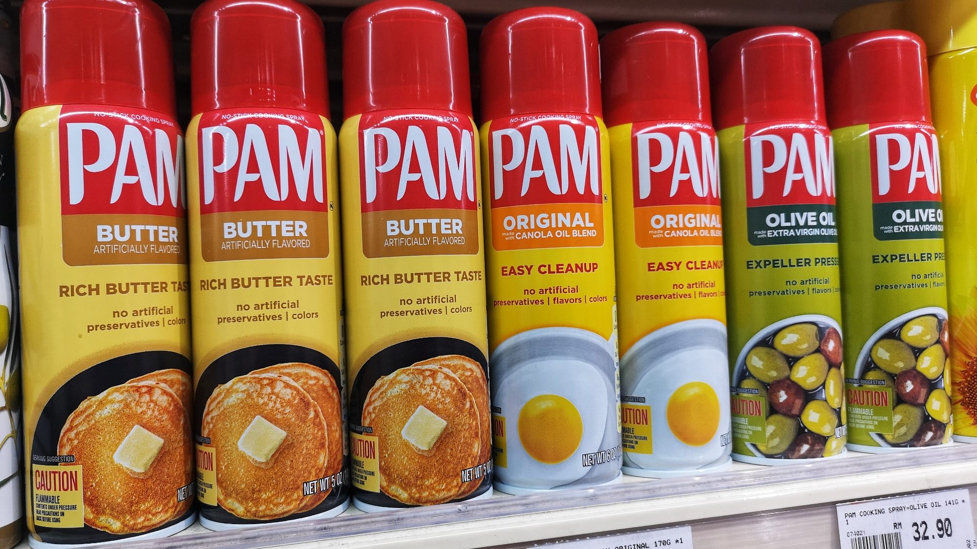 Pam cooking spray cans on a shelf