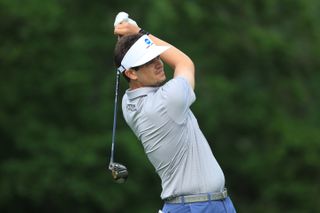 Hossler hits a fairway wood