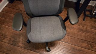 An overhead view of the Fractal Refine gaming chair's seat pan and armrests