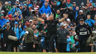 Ireland’s Shane Lowry celebrates on the 18th green at 148th Open Championship