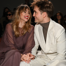 Suki Waterhouse and Robert Pattinson attend the Dior Fall 2023 Menswear Show on December 03, 2022 in Giza, Egypt.