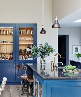 kitchen with blue cabinets and island