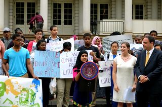 Alliance for Climate Education youth leader Afsana Akter speaks to youth, City Councilman Costa Constantinides and the press calling for climate action in New York City.