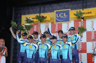 Team Astana takes the podium after its win in the TTT