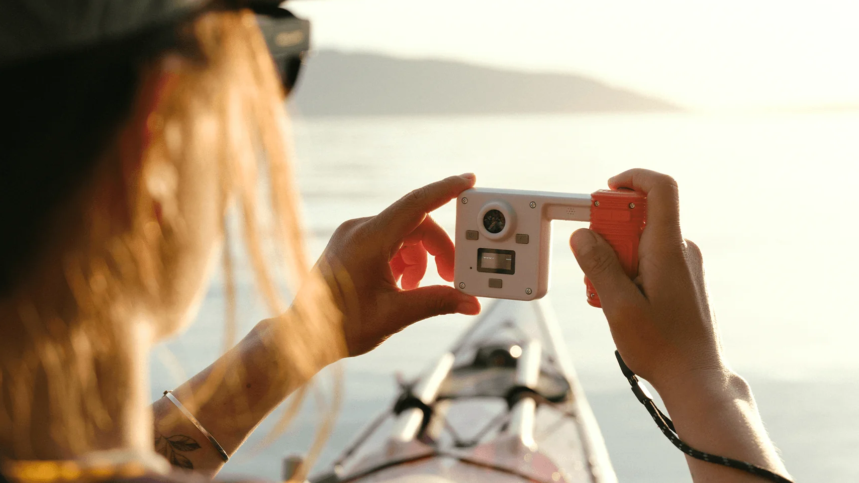 Photo of woman holding Portal ADN7 digital camera