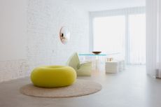Donut shaped pouf, table and chairs