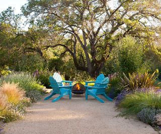 chairs and planting in backyard designed by Arterra