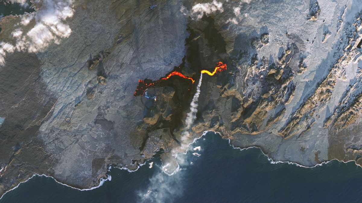 The fissure of lava coursing over Iceland&#039;s Reykjanes Peninsula.