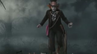 Johnny Depp as the Mad Hatter, walking across a table in Alice in Wonderland