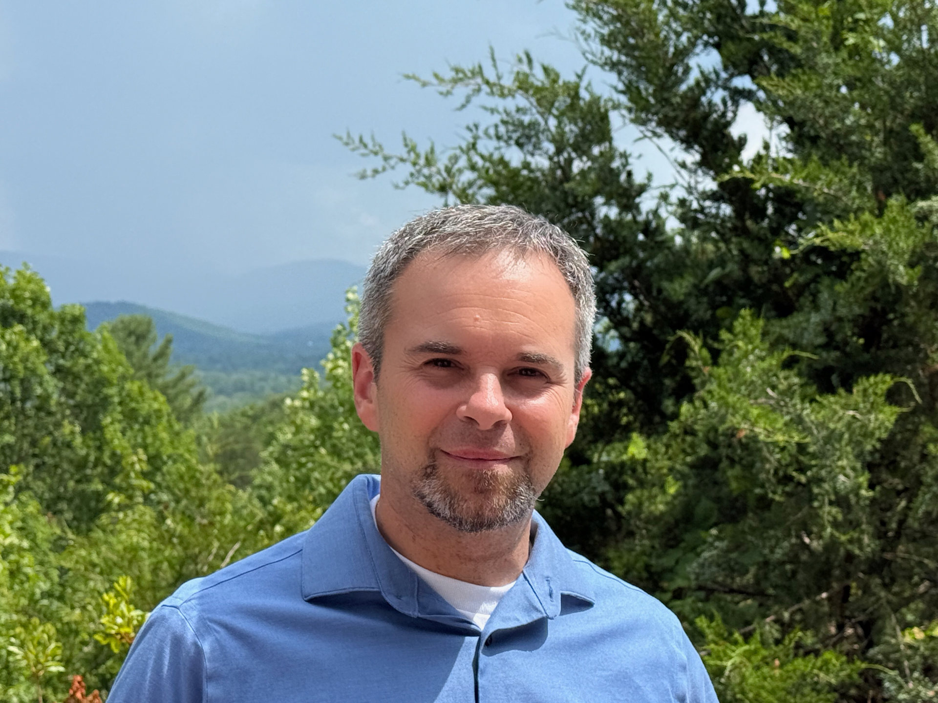 Smiling outdoor headshot of Arlen Schweiger.