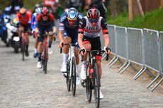 Tadej Pogacar leads Mathieu van der Poel on a cobbled section at the 2022 Tour of Flanders