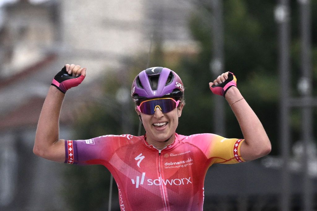 Team SD Worxs Swiss rider Marlen Reusser celebrates as she crosses the finish line to win the 4th stage of the new edition of the Womens Tour de France cycling race 1268 km between Troyes and BarsurAube eastern France on July 27 2022 Photo by Jeff PACHOUD AFP Photo by JEFF PACHOUDAFP via Getty Images