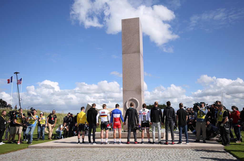 The riders pay their tributes at Utah Beach