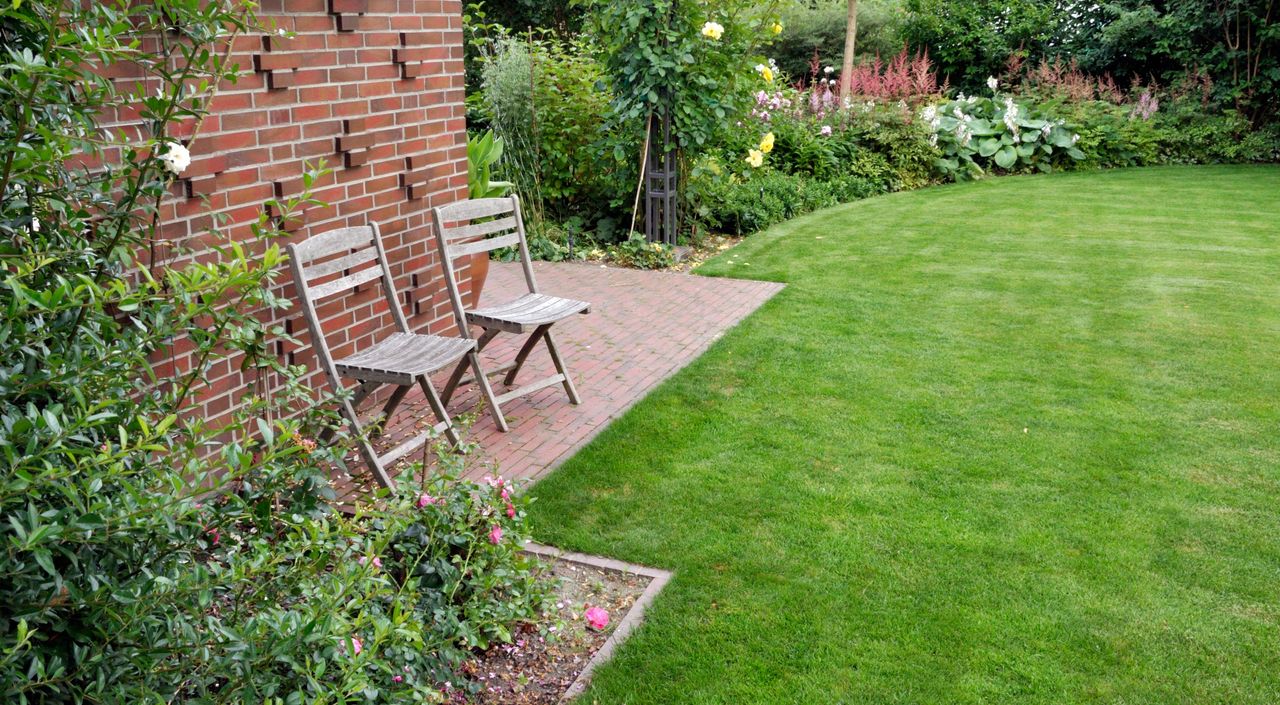 garden with lawn and flower beds