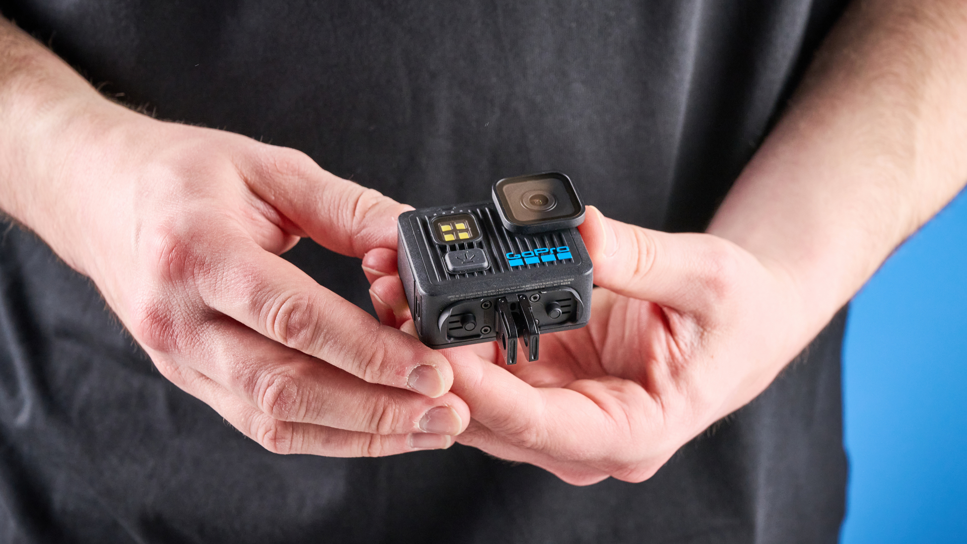 The GoPro LIT Hero against a blue background